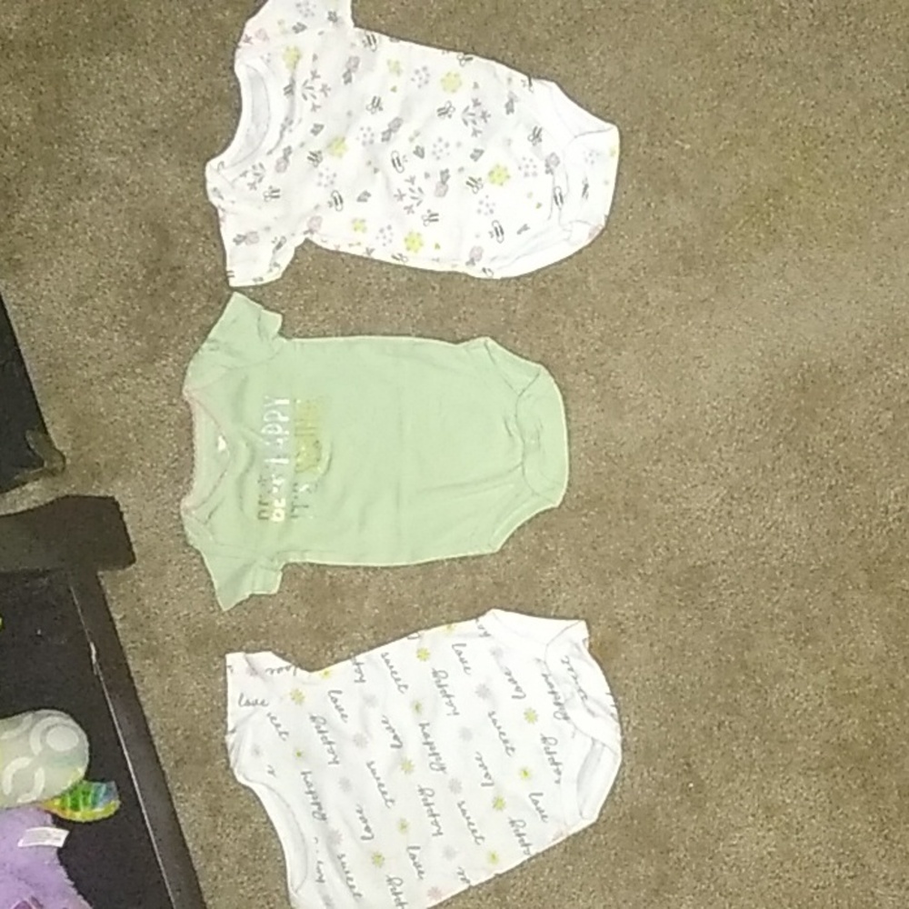 Never worn 0-3 months girl onsies